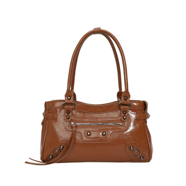 Brown leather handbag with visible hardware on a white background