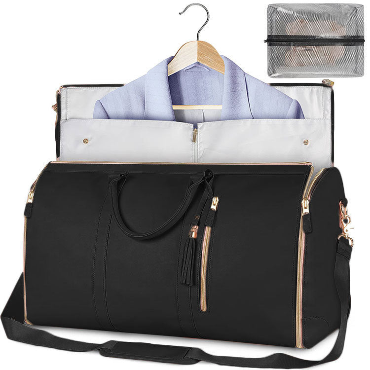 Black duffel bag with a shirt on a hanger and a clear pouch inside, on a white background